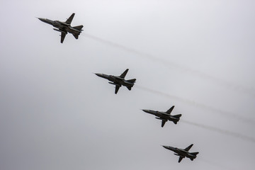 Combat aircraft fly in formation on May 9 Victory Parade