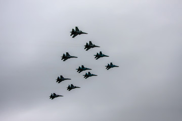 Combat aircraft fly in formation on May 9 Victory Parade