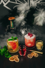 Fruit cocktails in smoke at the shisha bar