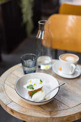 Dessert with Ice Cream and Coffee Served on Garden Table Outdoors