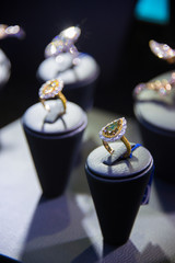 Fine luxury diamond jewellery window display with ring pedant