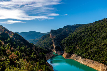 Naklejka na ściany i meble A picturesque landscape view of the valley with the canyon and the turquoise water of the Canelles river in the natural park of Congost de Mont-rebei (Spain)