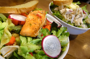 cut breast chicken salad and grill salmon salad