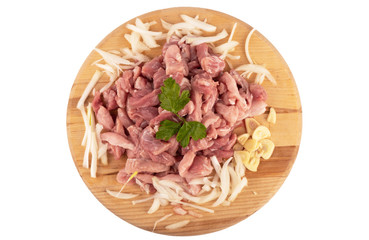 Top view. Chopped pork with chopped onions and garlic, garnished with parsley.