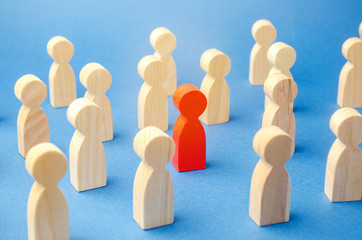 The red figure of a man stands out from the crowd. Infected person. Coronavirus pandemic infection...
