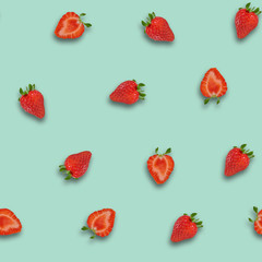 Red strawberry pattern with smooth blue-green background.