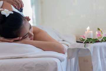 Obraz na płótnie Canvas Woman doing beauty treatment in spa salon Concept of health care and health beauty