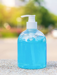 Hand sanitizer gel prevent the spread of the corona virus COVID-19 on bokeh background. Health care concept