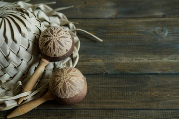 Vacation souvenirs. A Cuban hat from palm leaves on brown wood background