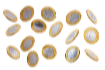 Coins falling on white background, effect and blur of movement and fall. Money rain.