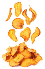Sweet potato chips falling into heap on white background