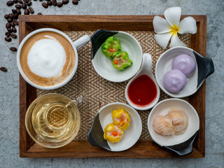 Fototapeta na wymiar Dim Sum menu set served with dipping sauce Tea and coffee set