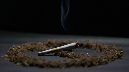 smoking cigarette on black