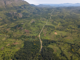 Aerial drone photography of a tropical landscape, with forest and mountains Kumbira forest reserve,