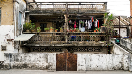 Shunde, Foshan, China - April 3, 2017:  old house in the small old town city in China, Asia, colonial architecture, British architecture, rich Easter Chinese culture, public streets, poverty in Asia
