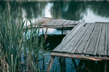 Old wooden pier near the lake