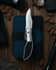 Knife on a book / Explorer with almonds
