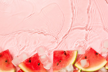 Wayermelon slice in water pink background, freshness, transparency