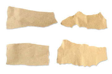 Recycled paper craft stick on a white background. Brown paper torn or ripped pieces of paper isolated on white background with clipping path.