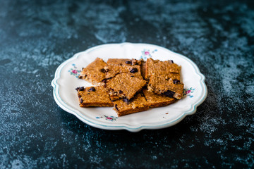 Organic Healthy Raw Oat Cake Slices Square Shaped with Banana and Chocolate Chips