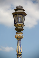 Fototapeta na wymiar Historical lamp on Plaza de Espana, Sevilla, Spain