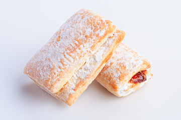 Gingerbread with berry jam on white background, isolated