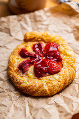 Sweet homemade creamy tart with glazed strawberry. Selective focus. Shallow depth of field.
