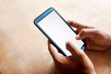 hand holding smart phone with white screen