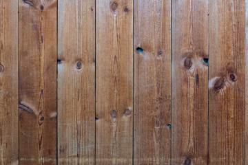 Old wood plank texture background. Close up of wall made of wooden planks. Old brown wooden wall background texture close up. Soft wood surface as background