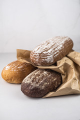 Assortment of baked bread,  Fresh bread, Different kinds of fresh bread, bread on a white background