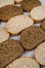 Assortment of baked bread,  Sliced bread, Fresh loaves of bread, Different kinds of fresh bread