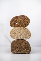 Assortment of baked bread,  Sliced bread, Fresh loaves of bread, Different kinds of fresh bread