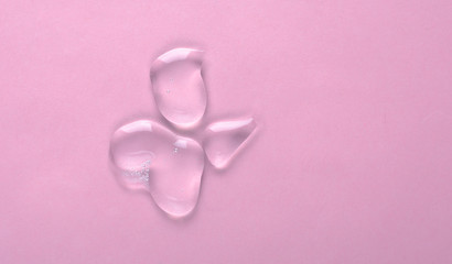 Obraz na płótnie Canvas Liquid gel cosmetic smudge texture purple lilac background