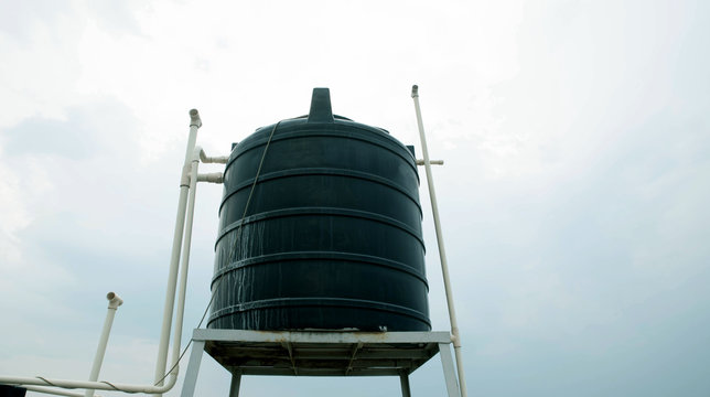 Over Head Tank On Sky Background