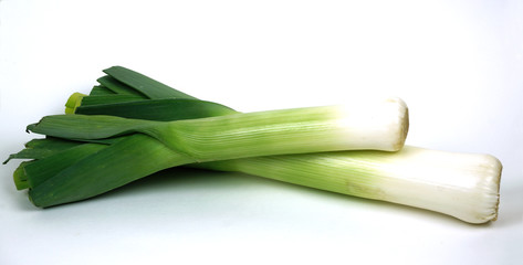 Bunch of leeks isolated on white background