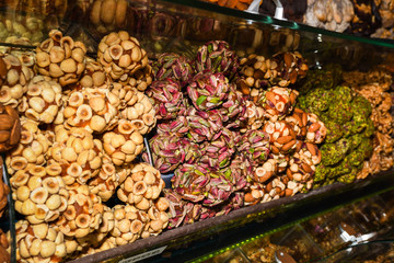 Various types of cakes, tart, mousse, pies for sale in bakery or pastry shop, gourmet luxury