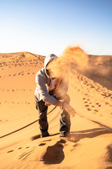 a man in the Sahara desert in North Africa