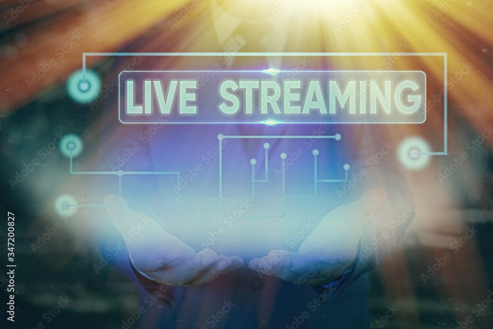 Poster handwriting text live streaming. conceptual photo transmit live video coverage of an event over the 
