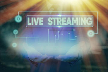 Handwriting text Live Streaming. Conceptual photo Transmit live video coverage of an event over the...