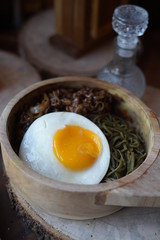 Green Noodle in a Wooden Bowl