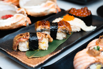 Foie gras, unagi, engawa and salmon roe sushi