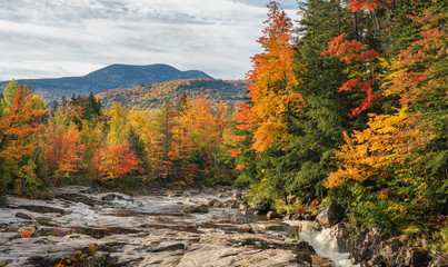 Swift River at the Rocky Gorge Scenic Area in Autumn on the Kancamagus Scenic Highway - White...