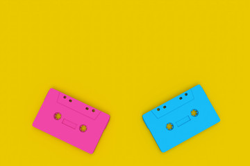 Blue pink cassette tape on against a yellow background in minimal flat style, 3D illustration.