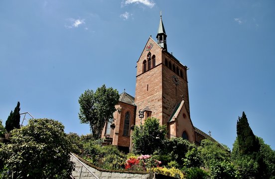 Low angle shot of an ancient building under a blue sky in the town of Kappelrodeck in Germany