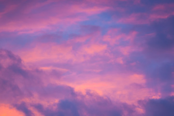 Unfocused pink and blue cloudy sky