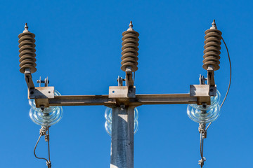 Insulators on top of a electricity pylon