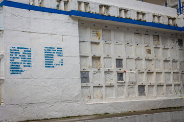 Medell&iacute;n, Antioquia / Colombia. February 25, 2018. Parish Cemetery of America located in San Javier. Vertical gardens, portraits in graffiti and names of victims of Colombian violence