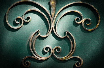 Wrought-iron gates, ornamental forging, forged elements close-up.