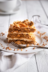 Piece of cake. Carrots and walnuts cake with creamy cheese