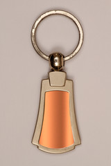 Keychain made of metals such as aluminum, brass, chrome which can be inscribed and emblemed for...